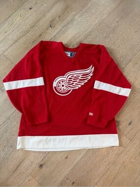 CCM Red Hockey Jersey with White Wing Logo